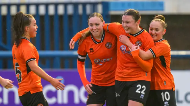 Dundee United players celebrate