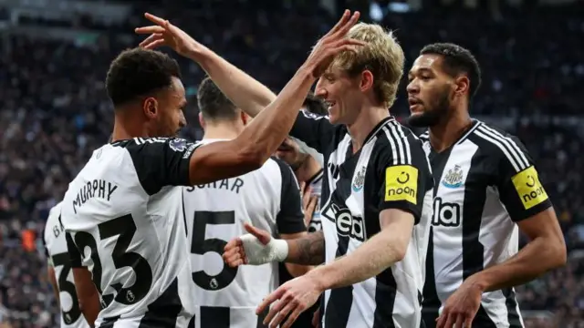 Jacob Murphy celebrates with Anthony Gordon after scoring for Newcastle against Leicester in the Premier League