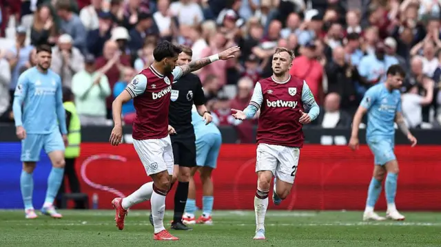 West Ham players celebrate scoring against Nottingham Forest