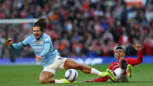 Casemiro tackles Jack Grealish
