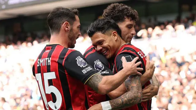 Evanilson celebrates with his team-mates after scoring for Bournemouth against Tottenham Hotspur in the Premier League