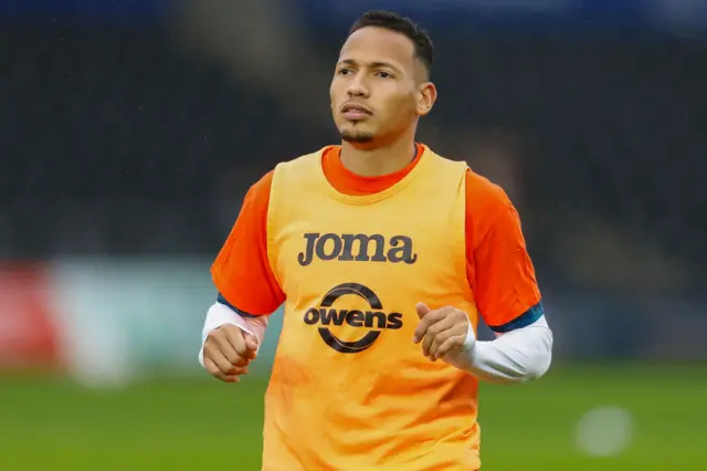 Ronald warms up before Swansea's game against Plymouth