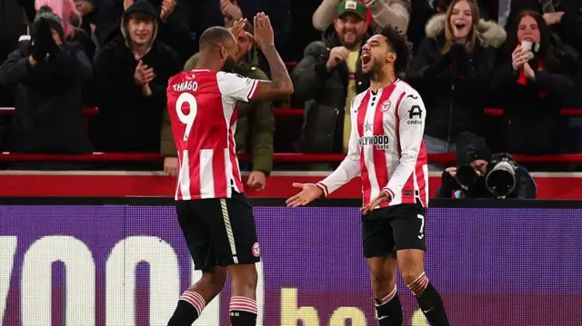 Brentford's Kevin Schade celebrates with Igor Thiago