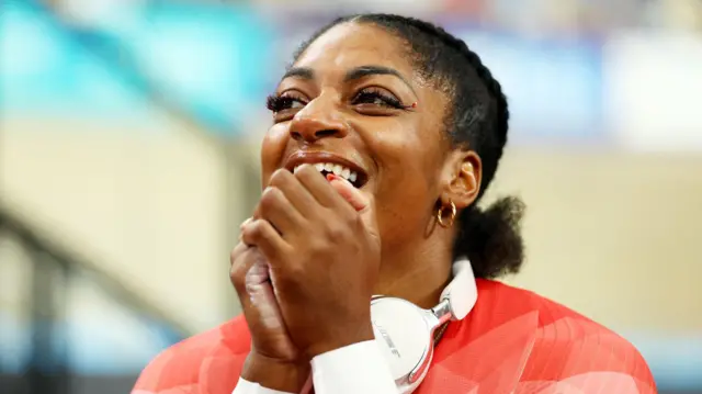 Kadeena Cox holds her hands together in front of her face after winning silver at the Commonwealth Games
