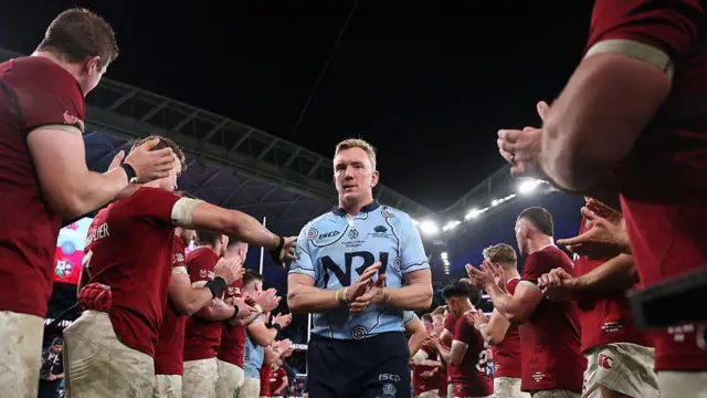 Hugh Sinclair claps the Lions