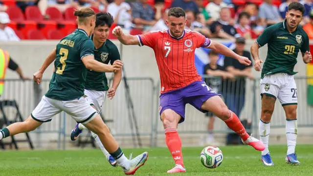 Scotland's John McGinn in action against Bolivia