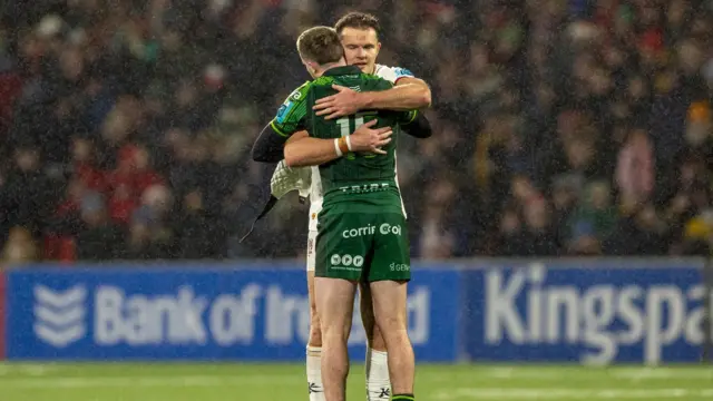 Jacob Stockdale embraces Mack Hansen