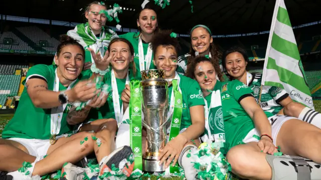 Celtic players with SWPL trophy