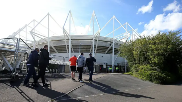 Fans make their way to the Swansea.Com Stadium