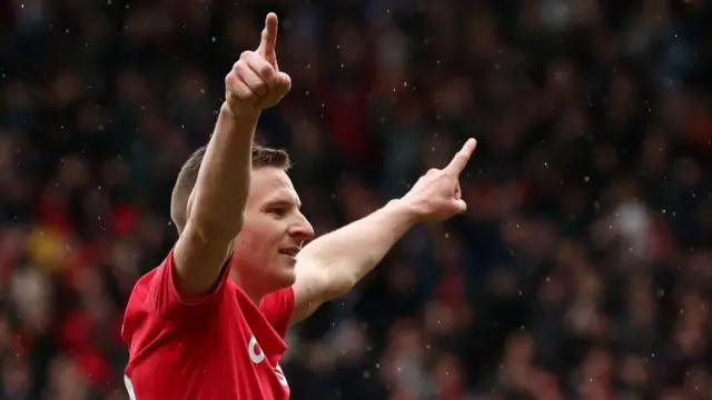 Paul Mullin celebrates a goal for Wrexham