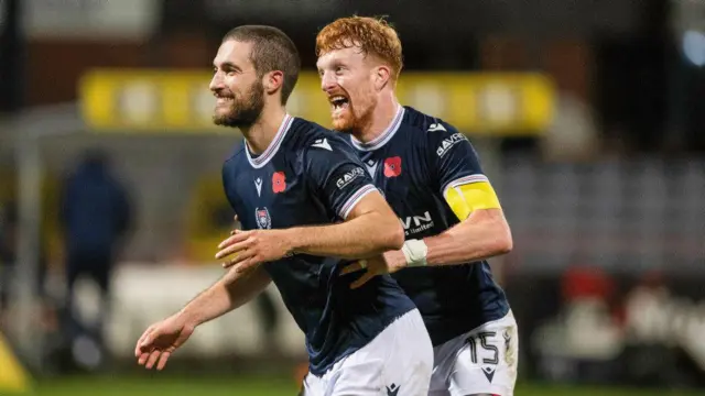 Ziyad Larkeche celebrates with Simon Murray