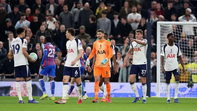 Micky van de Ven, Joao Paulhinha, Dominic Solanke and Guglielmo Vicario of Tottenham Hotspur react after Crytsal Palace's disallowed goal