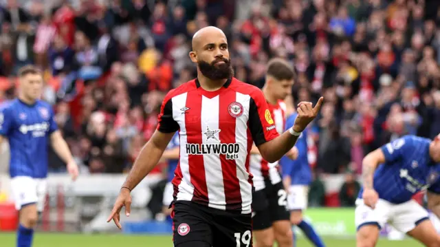 Bryan Mbeumo of Brentford celebrates after scoring his team's third goal from the penalty spot during the Premier League match between Brentford FC and Ipswich Town FC at Gtech Community Stadium