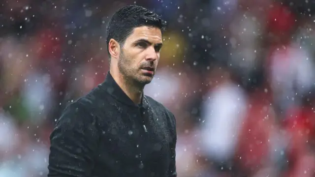 Mikel Arteta looks on