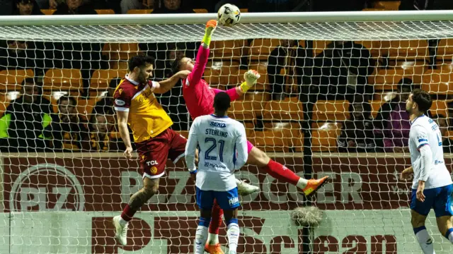 Rangers Jack Butland punches the ball into his own net but the goal is ruled out for a push from Motherwell's Tony Watt 