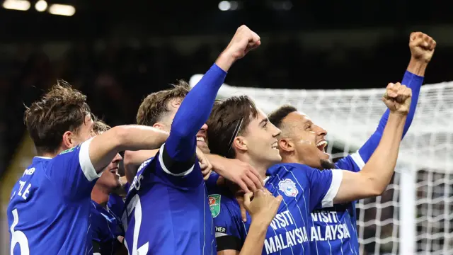 Cardiff City players celebrate in their EFL Cup win at Burnley 