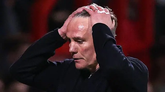 Wrexham manager Phil Parkinson looks dejected