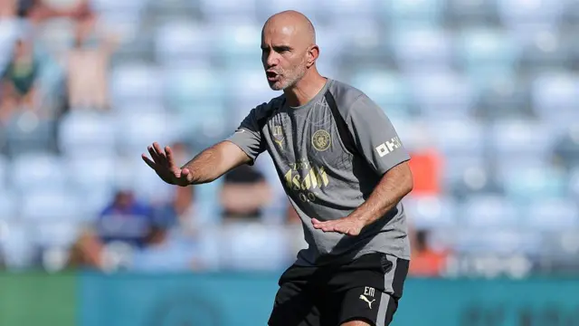 Enzo Maresca coaches during an open training session