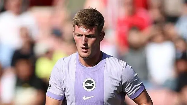 Charlie Penman in a Brighton kit