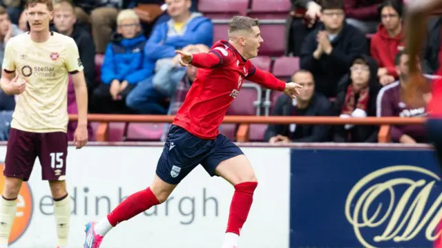 Ronan Hale celebrates after scoring for Ross County against Hearts