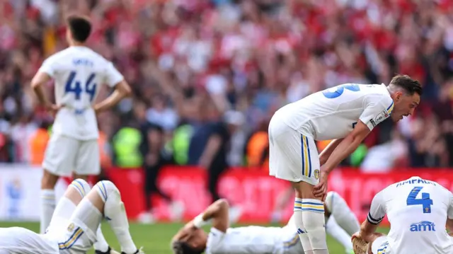 Leeds United players looking dejected after losing to Southampton in the 2024 Championship play-off final