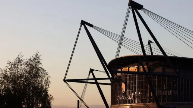 A view of Etihad Stadium at sunset