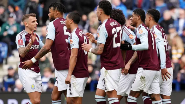 Aston Villa players celebrate