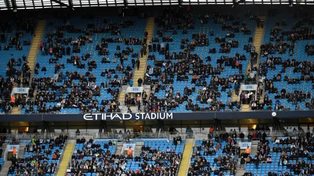 Empty seats inside the Etihad Stadium