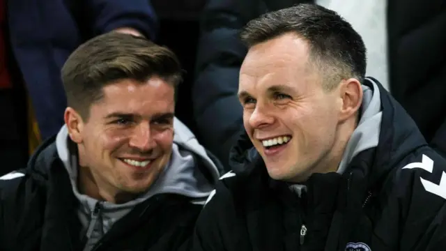 Hearts players Cammy Devlin and Lawrence Shankland