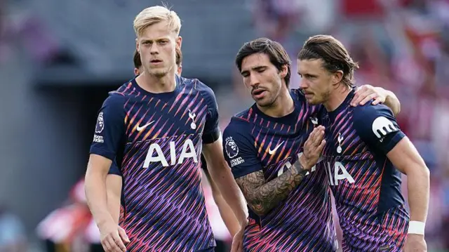 Sandro Tonali consoles Conor Gallagher 