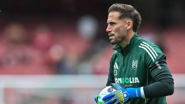 Steven Benda of Fulham warms up