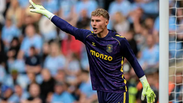 Carl Rushworth points and shouts during a match for Coventry