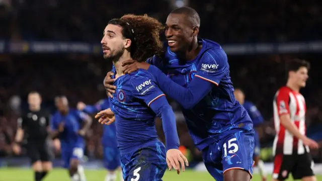  Marc Cucurella of Chelsea celebrates scoring his team's first goal with teammate Nicolas Jackson during the Premier League match between Chelsea FC and Brentford FC at Stamford Bridge.