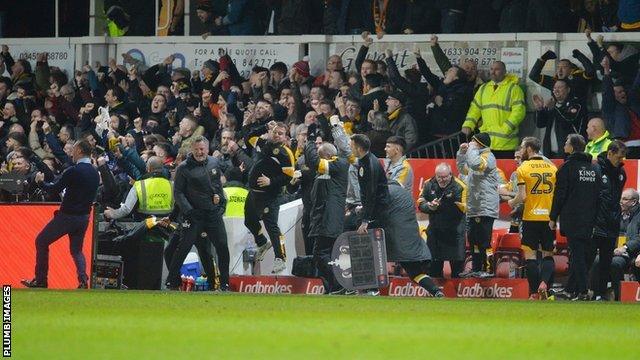 Newport manager Michael Flynn celebrates