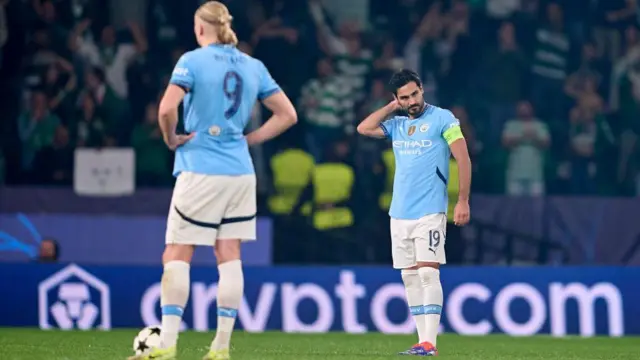 Ilkay Gundogan (right) and Erling Haaland (left) of Manchester City react after Viktor Gyokeres of Sporting CP scores his team's fourth goal during the UEFA Champions League match between Sporting CP and Manchester City at Jose Alvalade Stadium in Lisbon, Portugal