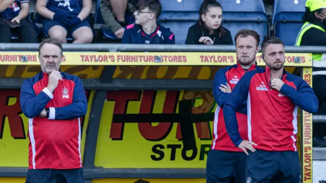 Falkirk coaches step in as John McGlynn is absent from the touchline during a pre-season friendly match between Falkirk and Edinburgh City at the Falkirk Stadium