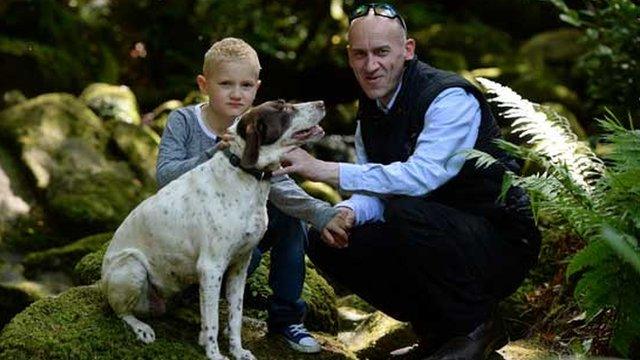 Robert Kenny, with son and dog Ace