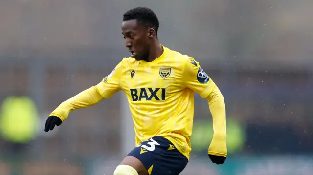 Oxford United winger Siriki Dembele dribbling with the ball