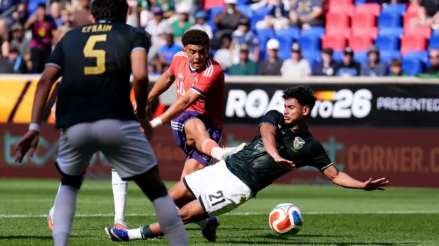 Scotland's Che Adams scores against Bolivia