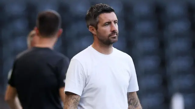 Swansea head coach Alan Sheehan on the touchline 