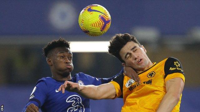 Chelsea's Callum Hudson-Odoi challenges Wolverhampton Wanderers' Max Kilman during a game in the Premier League