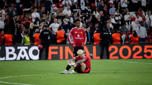 Amad Diallo and Alejandro Garnacho look on dejected from the pitch