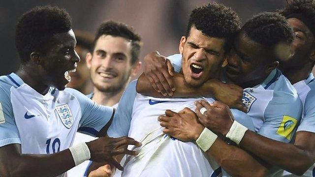 England's forward Dominic Solanke celebrates his goal with teammates