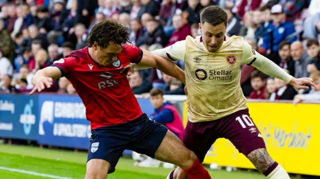 Ross County's James Brown and Hearts' Barrie McKay