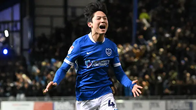 Yang Min-hyeok celebrates after scoring for Portsmouth