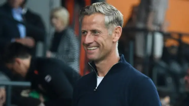 David Hughes looks on from the touchline during a game