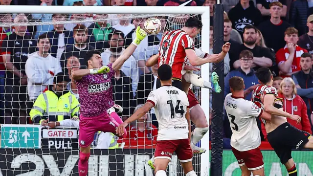 Kieffer Moore heads home the first goal