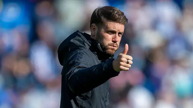Brighton boss Fabian Huerzeler puts his thumb up