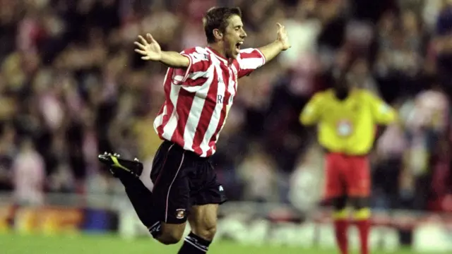 Kevin Phillips with his arms outstretched celebrating scoring a goal for Sunderland