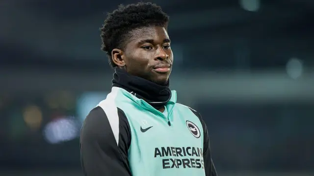 Carlos Baleba warms up for Brighton